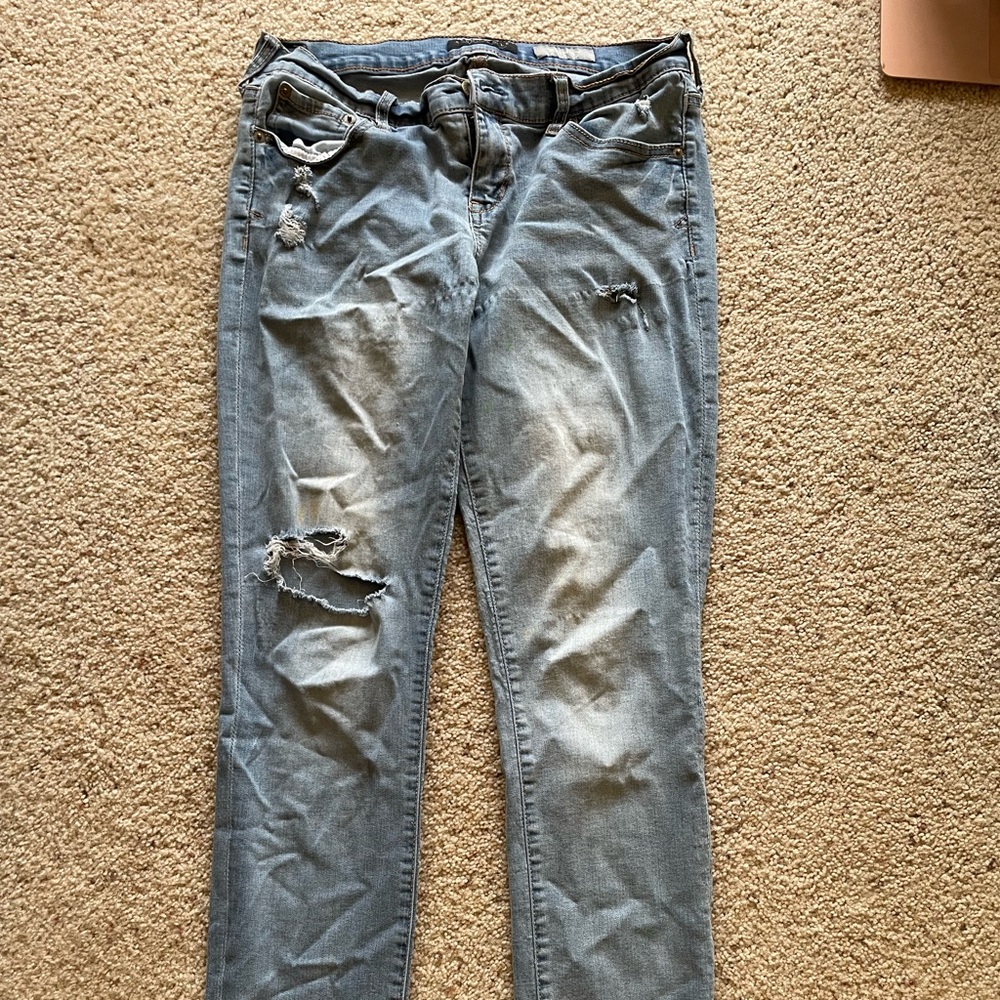 Ripped light wash skinny jeans